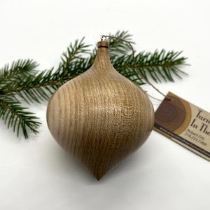 Turned wooden Christmas ornament. Recycled maple wood.