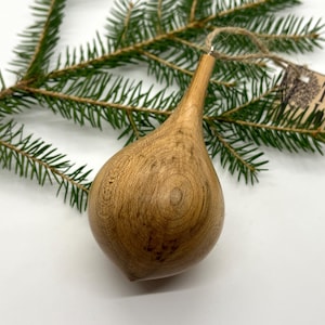 Turned wooden Christmas ornament. Recycled maple wood.