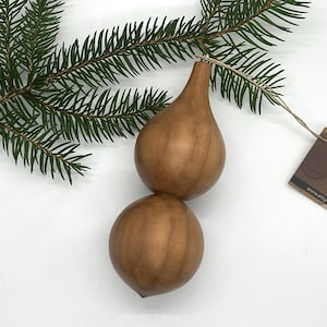 Wooden Christmas ornament.  Turned recycled apple wood.