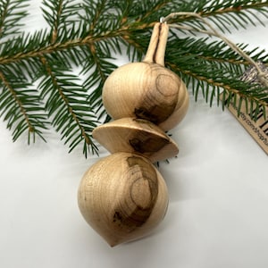 Turned Christmas ornament. Recycled ambrosia maple wood.