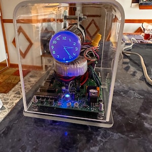 Oscilloscope Clock or Scope clock century font Wi-Fi and GPS included. Cathode ray tube vintage analog technology VCR522 CRT.