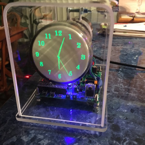 Oscilloscope Clock or Scope clock made with DG7-12C flat faced CRT, vintage analog technology saved from obsolescence with new digital tech