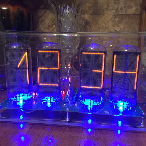 Homemade B7971 Nixie Clock, made with B7971 nixie tubes, RGB led underlighting, user selected.
