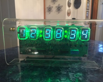 Homemade six-digit VFD Clock, made with IV-22 vfd tubes, RGB led backlighting, user selected.