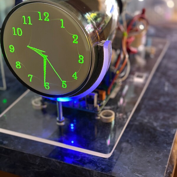 Oscilloscope or Scope clock made with 5" cathode ray tube, "century" style font, vintage analog technology w/ digital tech very short CRT.