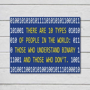 May include: A blue rectangular sign with white and yellow text. The text reads: "THERE ARE 10 TYPES OF PEOPLE IN THE WORLD: THOSE WHO UNDERSTAND BINARY AND THOSE WHO DON'T."