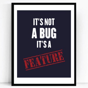 May include: A dark blue poster with white text that reads "It's not a bug it's a feature" with the word "feature" in a red stamp.