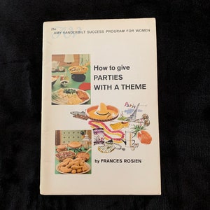 May include: A vintage book titled "How to Give Parties with a Theme" by Frances Rosien. The cover features illustrations of food and party decorations, with the text "The Amy Vanderbilt Success Program for Women" at the top.