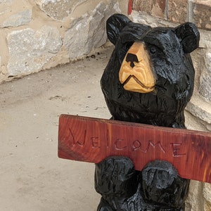 Chainsaw Carved Black Bear Welcome Sign to Greet Your Guests with a Wooden Statue on Your Front Porch, Yard or Home Entrance