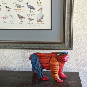 5.5 Inches in Height Original Handmade, Hand Painted Animal, Wood Carving with Irate Eyes, Copper Colored Tail, Colorful Patterned Body, Blue Colored Hind legs, Bear Alebrije, Oaxaca Art, Unique Statue from https://luv2brd.com