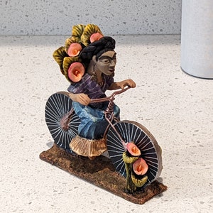 Handmade Gift | Woman on Bicycle with Lillies Original Folk Art & Clay Figurine, Unique Home Decor from Oaxaca, Mexico by Jose Juan Aguilar