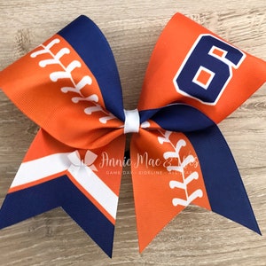 Orange and Navy Softball team cheer bow