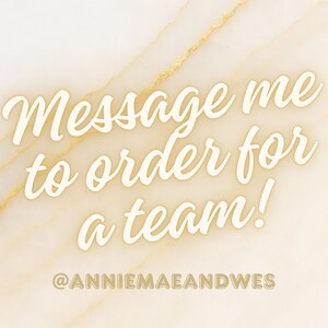 May include: Cream-colored text on a marble background reads "Message me to order for a team!" The text is in a cursive font. The bottom of the image includes the text "@ANNIEMAEANDWES" in a smaller font.