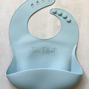 Personalized Light Blue Toddler Bib for Baby Led Weaning with Custom Name Laser engraved with Flowers