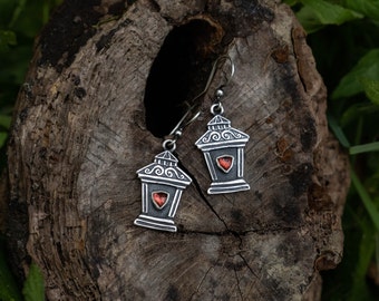 Sterling silver lantern earrings with red garnet gemstones