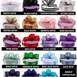 May include: A chart showing 16 different ribbon colors available for purchase. The ribbon colors are arranged in four rows of four. Each ribbon is tied into a bow and displayed on a purple background. The ribbon colors are: white, black, black and white, silver, toffee, gold, quartz, rose gold, wine, red, lilac, purple, mint, emerald, baby blue, slate, navy, royal blue, turquoise. The text "AVAILABLE RIBBON COLOR CHOICES" is at the top of the chart. The text "REQUEST CUSTOM COLOR ON ORDERS OVER 50 PIECES" is at the bottom of the chart.