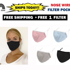 Pode incluir: Quatro máscaras faciais com laços ajustáveis para as orelhas. Duas máscaras são pretas, uma é xadrez rosa e branco, e outra é xadrez azul e branco. As máscaras têm um fio para o nariz e um bolso para o filtro. O texto "SHIPS TODAY!!" e "FREE SHIPPING + FREE 1 FILTER" é exibido acima das máscaras.