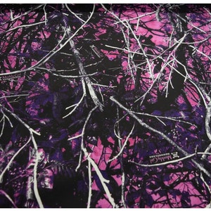 May include: Pink and purple camouflage fabric with a white branch pattern.