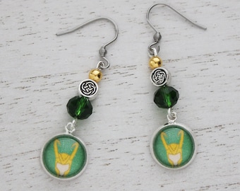 Green Loki Earrings - Handmade Art Charm Loki Helm Cabochon - Comic Inspired Jewelry - Silver Dangle Earrings - Loki Thor Geek Gift