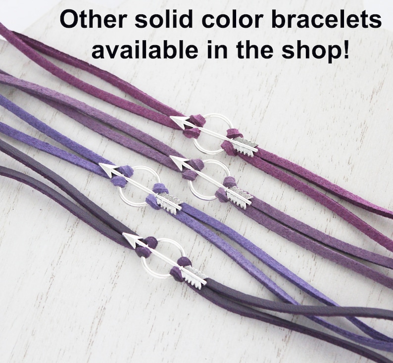 May include: Four suede bracelets in shades of purple with silver arrow charms.  Other solid color bracelets available in the shop!