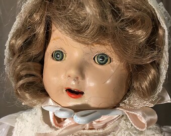 19" unmarked composition girl doll, cosmetic issues