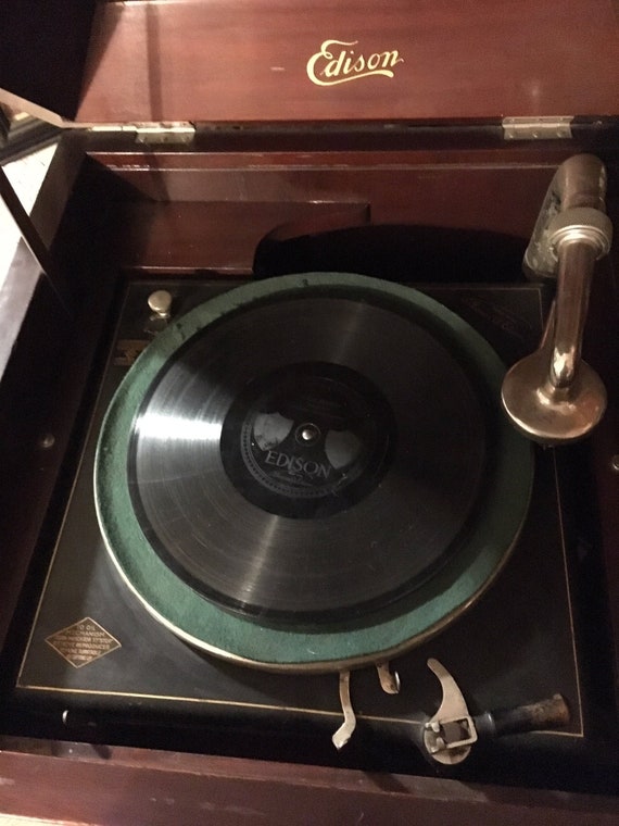 kewpie doll lamp on the phonograph