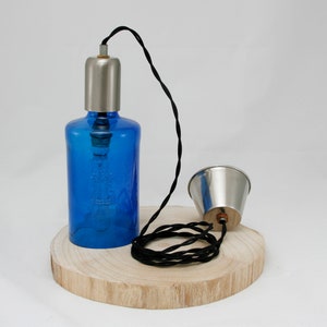 Blue lamp upcycling mineral water