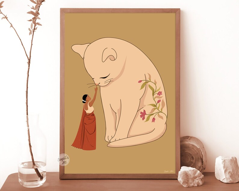Pode incluir: Uma ilustra&ccedil;&atilde;o digital de uma mulher com um sari vermelho que estica a m&atilde;o para tocar o nariz de um gato grande de cor clara com videiras florais no lado. O fundo &eacute; de cor marrom claro.