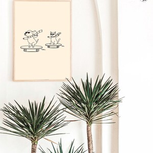 May include: A black and white line drawing of a dog and a cat wearing sunglasses and scarves, skateboarding. The image is on a beige background.