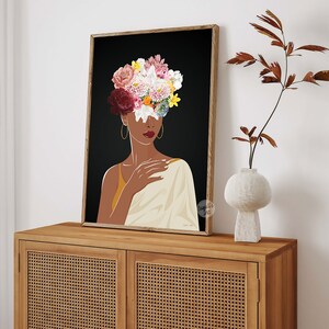 May include: A digital illustration of a woman with a crown of flowers covering her face. The woman is wearing a white shawl and has brown skin. The background is black.