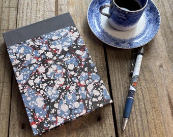 Unique notepad holder