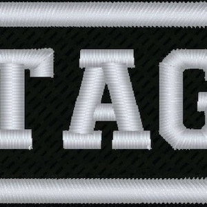 May include: Embroidered name tag with the words "NAME TAG" in white capital letters. The text is centered on a black rectangular background, framed by a white border.