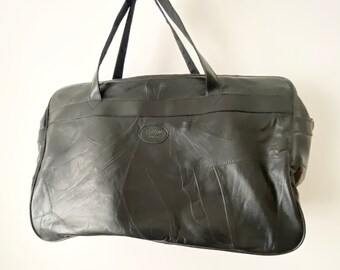 Cotton traders leather patchwork travel bag deals