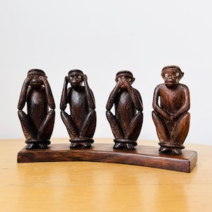 Wooden four wise monkeys - see no evil, hear no evil, speak no evil, do no evil