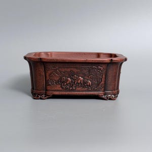 Antique-Style Yixing Zisha “Myriad Elephants” Chamfered Rectangular Bonsai Pot with Cloud Feet