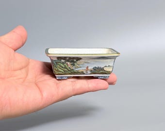 Miniatura rectangular para bonsái con paisaje de ventana en azul y blanco, pintada a mano al estilo antiguo.