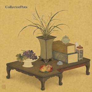 May include: A still life painting on a textured yellow background featuring the text CollectorPots. A dark wooden table holds a square green vase with white flowers, a bowl of purple grapes, two stacked rectangular boxes, and pomegranates.