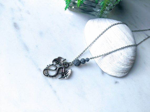 Dragon Aromatherapy Essential Oil Necklace Pendant Diffuser W/ 6 Volcanic stones Dragon Aromatherapy Essential Oil Necklace Pendant Diffuser W/ 6 Volcanic stones