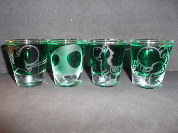 4 Yoshi Etched shot glasses