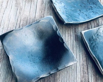 Portavelas de metal forjado de herrero