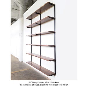 6-shelf wall mounted shelving unit with black walnut hardwood and sleek industrial steel brackets.