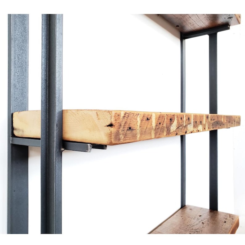 detailed image of heavy duty solid metal channel shelf brackets with reclaimed pine shelves.
