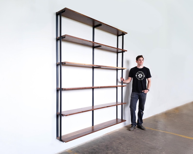 tall wall mounted bookshelf. Floating bookase hand-made with steel brackets and black walnut wood shelves. 6 shelf unit 7.5 ft high with bookend brackets