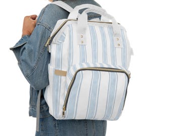 Mochila cambiador/bolsa para pañales con rayas de acuarela azul