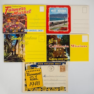 May include: Five vintage postcards featuring scenes from California. The postcards are yellow, red, and white with images of a farmers market, a beach, a mission, a street in Santa Barbara, and the Tournament of Roses parade. The postcards have the text "Greetings from Farmers Market Los Angeles, Calif." "Greetings from the West Beaches of Los Angeles County" "All the California Missions" "Santa Barbara Calif." "Pasadena Tournament of Roses 1948".