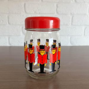 May include: A set of three ceramic mugs with a speckled, matte finish. The mugs are in shades of cream, light gray, and dark gray. Each mug has a simple, minimalist design, perfect for coffee or tea.