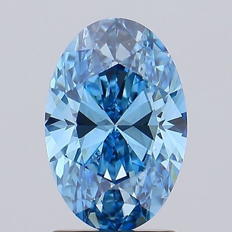 1.94 Carat Oval Fancy Vivid Blue Diamond, Rare Color, Diamond Halo Setting,18k White Gold Anniversary Ring, IGI Certified Rings In Stock image 7