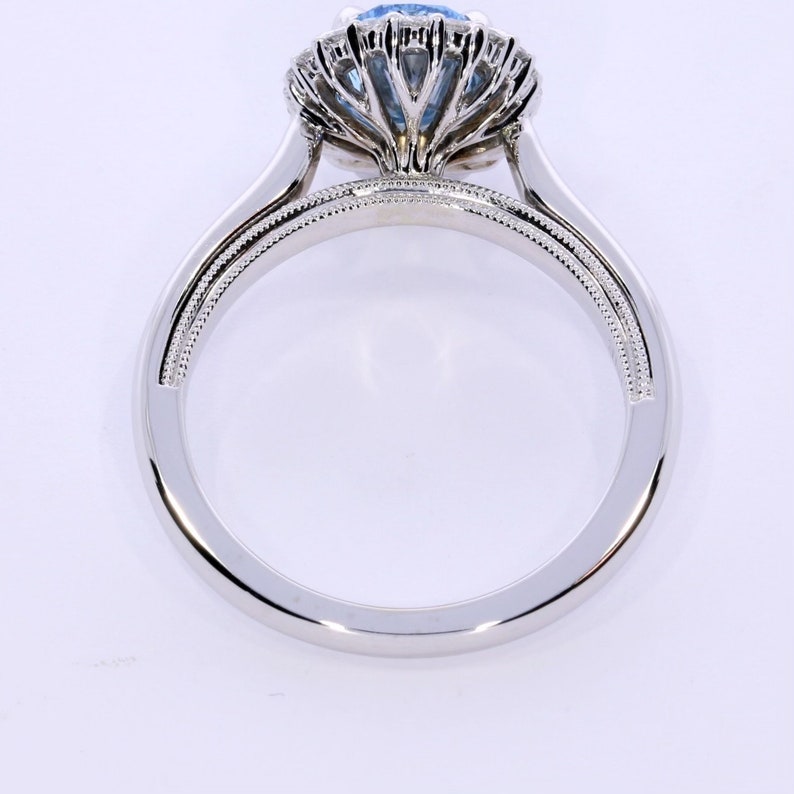 1.94 Carat Oval Fancy Vivid Blue Diamond, Rare Color, Diamond Halo Setting,18k White Gold Anniversary Ring, IGI Certified Rings In Stock image 3