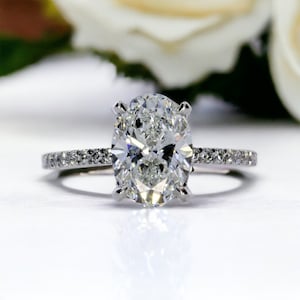 2.50 Carat IGI Certified E|VVS2 Elongated Oval Cut Lab Created Hidden Halo Diamond Engagement Ring, Side Round Diamonds, 14k White Gold