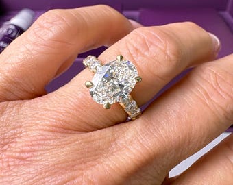 3 karaat ovale laboratoriumdiamant verborgen halo verlovingsring: band van 3,55 mm, 14k geelgoud